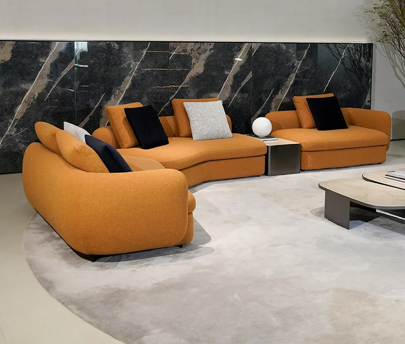 Caramel curved sofa in a living room