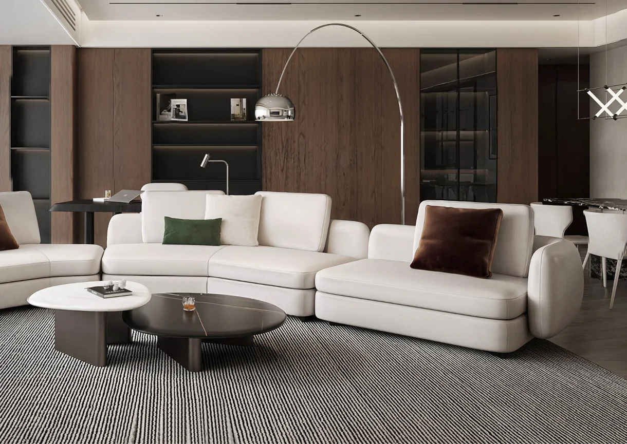 Curved white sectional sofa in a modern lounge