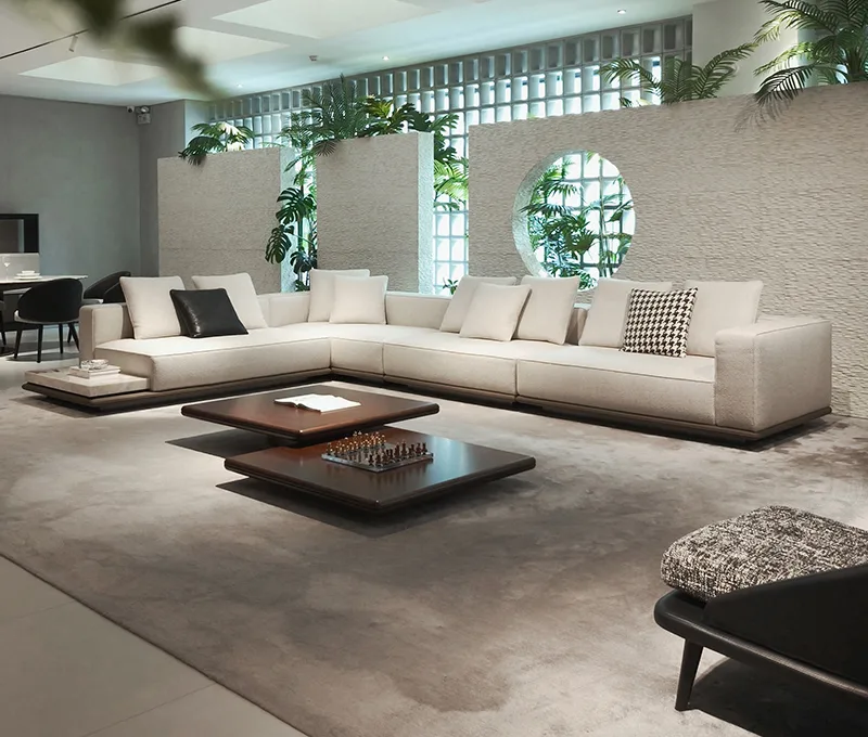 Large cream modular sofa with walnut coffee tables